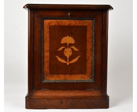 An inlaid cabinet with a floral motif,  opening to reveal three small drawers, and a lower shelf, dimensions 36.5cm x 42cm x 