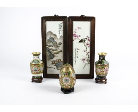 A pair of Chinese Republic Period famille rose plaques,  one depicting a bird perched on a branch, the other a typical landsc