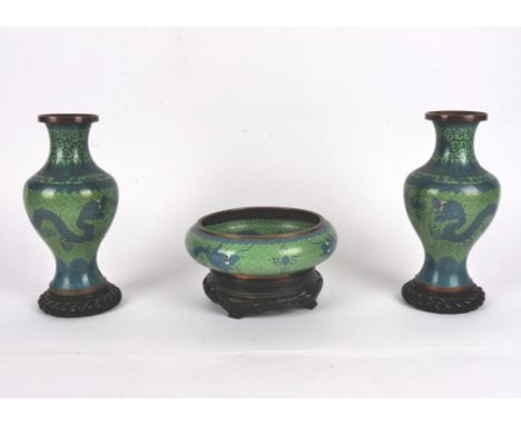 A pair of Chinese Cloisonné vases,  together with a bowl, all with a pattern formed with ruyi sceptre heads, plantain leaves,