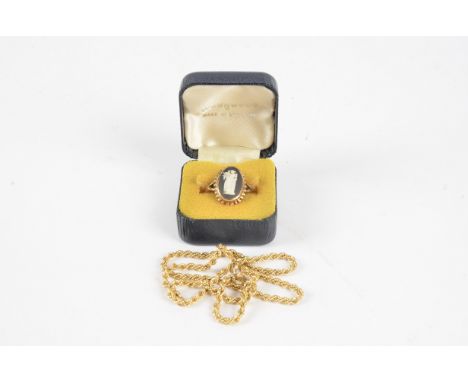 A 9ct gold Wedgwood Jasperware panel ring, depicting a classical figure playing the harp, in the original box, together with 