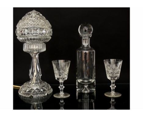 A 20th Century glass table lamp, with moulded decoration, height 37cm, together with a contemporary decanter, height 31cm, tw