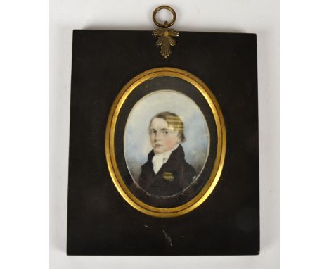 A 19th Century portrait miniature, of a young man in black coat, with white neckerchief, the reverse with label for 'Charles 