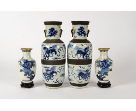 A pair of Chinese crackleware vases,   with three glazed sections, divided by bisque borders, each decorated with mythical cr