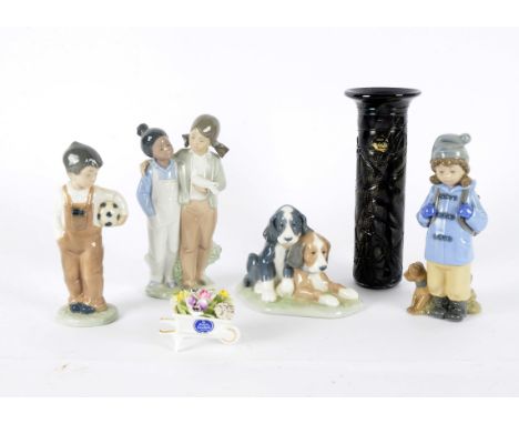 Ten Nao by Lladro porcelain figures, modelled as children and animals, together with two Royal Doulton models of flowers, one