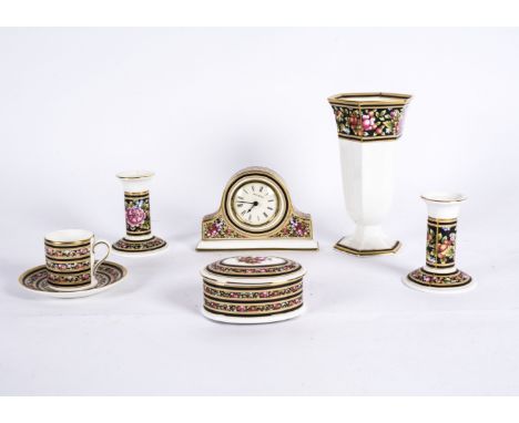 A group of predominantly Wedgwood wares,  in the Clio pattern, including a photograph frame, height 17cm, a mantle clock, tru