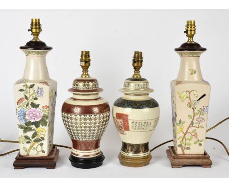 Four contemporary Chinese porcelain lamp bases, with hardwood bases, two in the form of ginger jars, 35cm max high and a pair