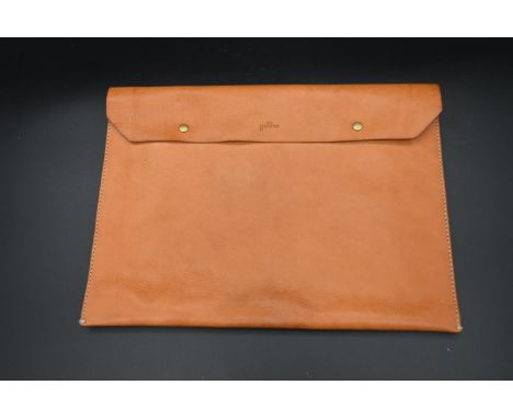 A Dan Genten light tan leather documents clutch wallet, impressed with maker's name and with label to the fitted interior. H.