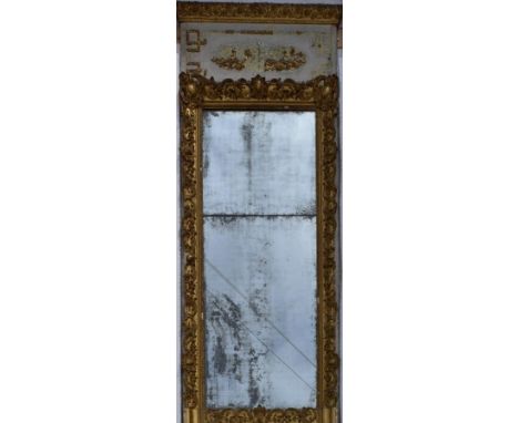 A 19th century carved giltwood and gesso full height pier mirror with painted architectural pediment above original plates. H