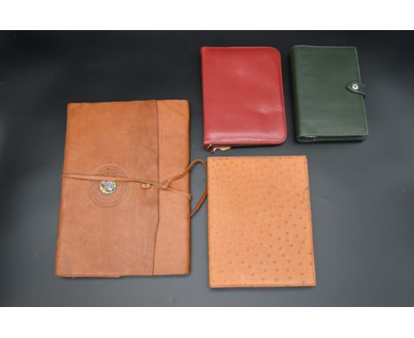 An Hermes diary for 2001 in ostrich skin along with a leather cased diary and a Smythson of Bond Street green leather organis