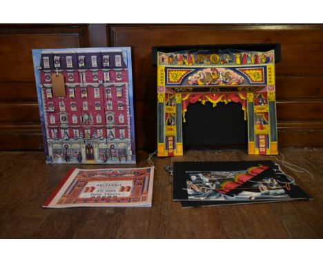 A pop up model of a 19th century style stage and an unopened Fortnum and Mason advent calendar. H.49 W.53 D.10cm 
