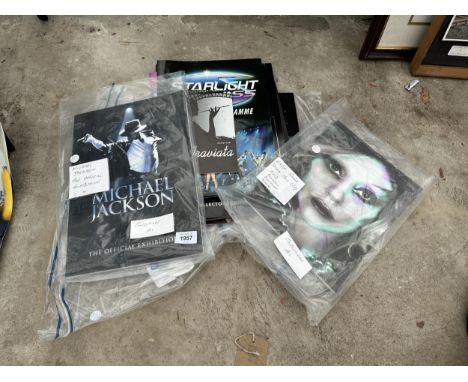 AN ASSORTMENT OF PROGRAMMES AND BROCHURES TO INCLUDE MICHAEL JACKSON AND LADY GAGA ETC 