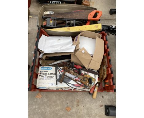 AN ASSORTMENT OF TOOLS TO INCLUDE A TILE CUTTER, SAWS AND RASPS ETC 