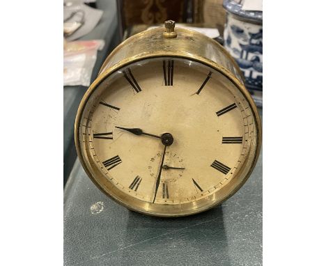 A VINTAGE BRASS ROUND DASHBOARD CLOCK 