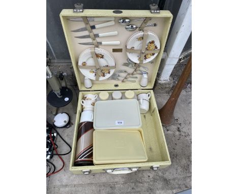 A RETRO BREXTON PICNIC HAMPER WITH CONTENTS (MISSING ONE FLASK) 