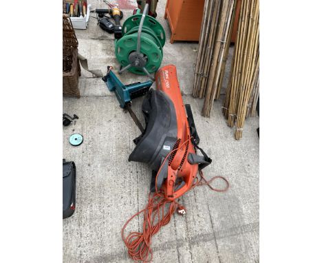 THREE GARDEN ITEMS TO INCLUDE A FLYMO LEAF VAC AND A BLACK AND DECKER ELECTRIC CHAINSAW ETC 