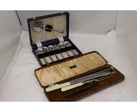 TWO VINTAGE BOXED SETS OF FLATWARE TO INCLUDE DESSERT SPOONS AND A CARVING SET 