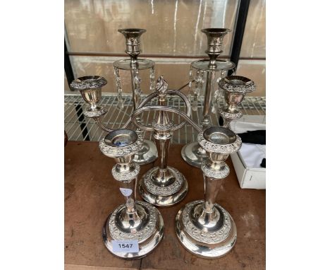 TWO PAIRS OF SILVER PLATED CANDLESTICKS AND A FURTHER TWISTED TWO BRANCH CANDLESTICK 