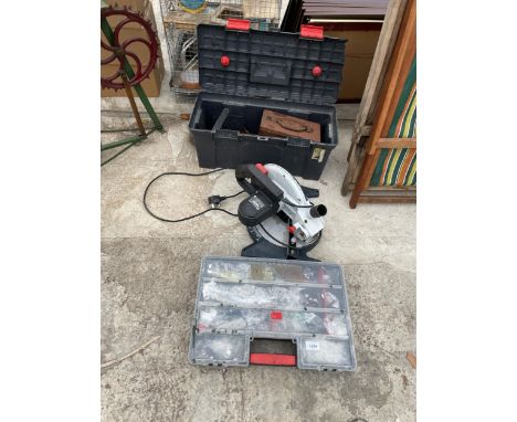 AN ASSORTMENT OF TOOLS TO INCLUDE SPANNERS, A COMPOUND MITRE SAW AND A HARDWARE CARRY CASE ETC 