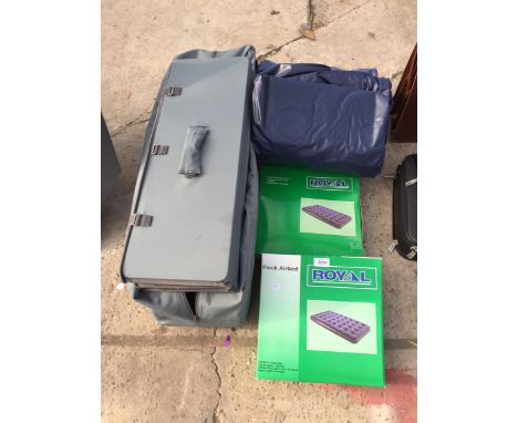 A TRAVEL COT AND THREE AIR BEDS 