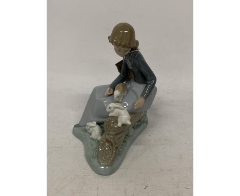 A NAO FIGURE OF A LADY WITH RABBITS 