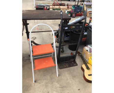 A SMALL BLACK AND DECKER SACK TRUCK AND A SMALL METAL STEP LADDER 