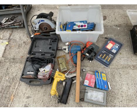 AN ASSORTMENT OF TOOLS TO INCLUDE A NUTOOL RIP SAW, A PALM SANDER AND NAIL GUNS ETC 