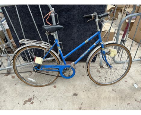 A VINTAGE LADIES TRIUMPH BIKE 