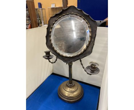 A VINTAGE ADJUSTABLE SHAVING MIRROR WITH CANDLE HOLDERS 