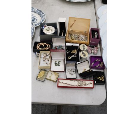 A LARGE QUANTITY OF COSTUME JEWELLERY AND ENAMEL TRINKET B0XES 