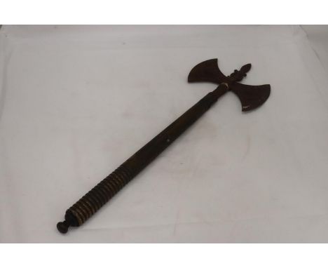A VINTAGE DOUBLE HEADED GRYPHON AXE 