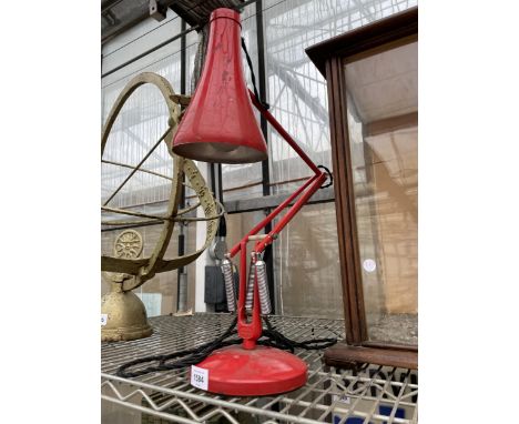 A VINTAGE RED ANGLE POISE LAMP 