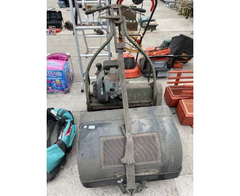 A LARGE VINTAGE CYLINDER MOWER COMPLETE WITH HONDA ENGINE AND GRASS BOX 