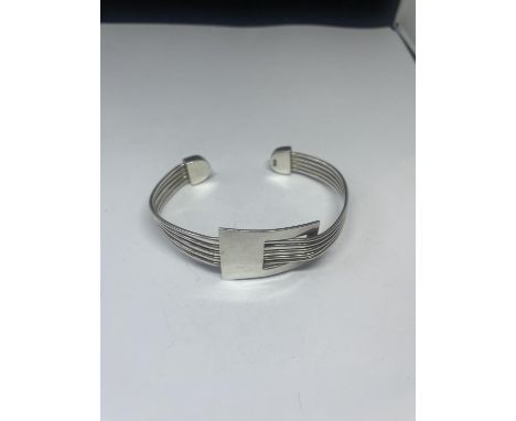 A SILVER BANGLE 