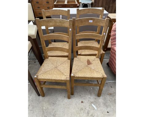 A SET OF FOUR MODERN HARDWOOD DINING CHAIRS WITH LADDER BACKS AND RUSH SEATS 