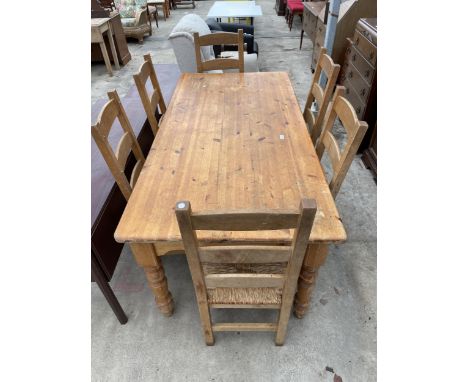 A MODERN PINE KITCHEN TABLE ON TURNED LEGS, 72" X 36" AND SIX LADDER BACK CHAIRS WITH RUSH SEATS 