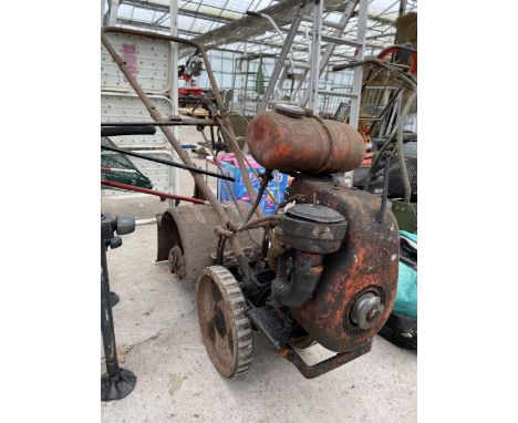 A VINTAGE PETROL ENGINE GARDEN ROTAVATOR 