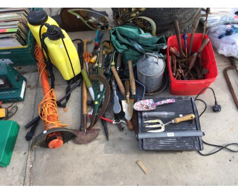 AN ASSORTMENT OF TOOLS TO INCLUDE AN ELECTRIC TILE CUTTER, A GALVANISED POULTRY DRINKER AND A KNAPSACK SPRAYER ETC 