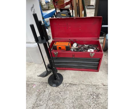 A METAL TOOL BOX CONTAINING TOOLS AND A FIRESIDE COMPNAION SET 