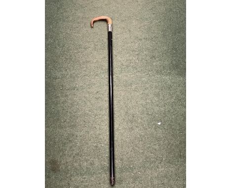 A BONE HANDLED WALKING STICK WITH A CHESTER HALLMARKED SILVER COLLAR 