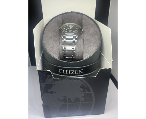 A BOXED CITIZEN TITANIUM WRIST WATCH SEEN WORKING BUT NO WARRANTY 