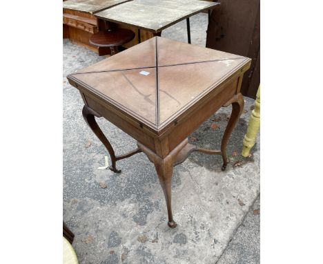 A LATE VICTORIAN MAHOGANY ENVELOPE CARD TABLE WITH SINGLE DRAWER AND UNDER SHELF 