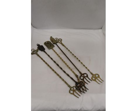 FIVE VINTAGE BRASS TOASTING FORKS 