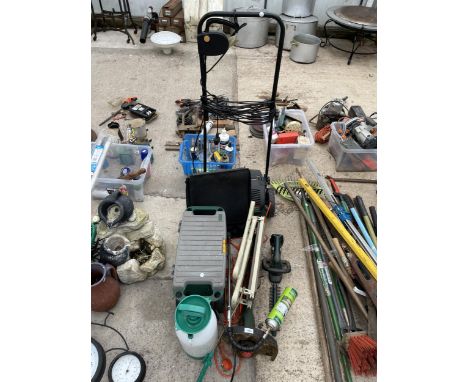 AN ASSORTMENT OF TOOLS TO INCLUDE A GRASS STRIMMER, A HEDGE TRIMMER AND AN ELECTRIC LAWN RAKE ETC 