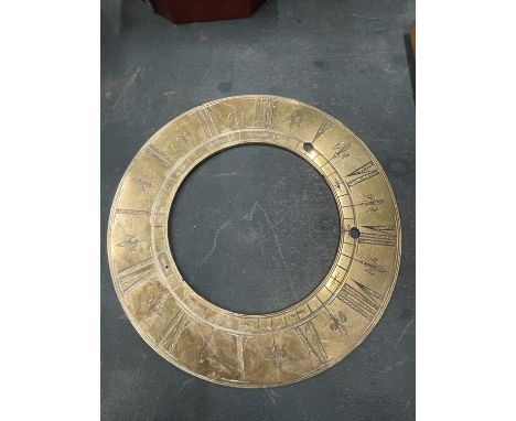 A LARGE VINTAGE BRASS CLOCK CHAPTER RING, DIAMETER 23CM 