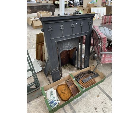 A DECORATIVE CAST IRON FIRE PLACE WITH GRATE AND FRONT ETC 