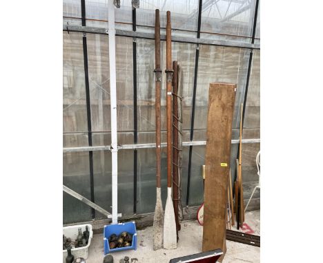 A SET OF VINTAGE BOAT ORES AND A SAIL 