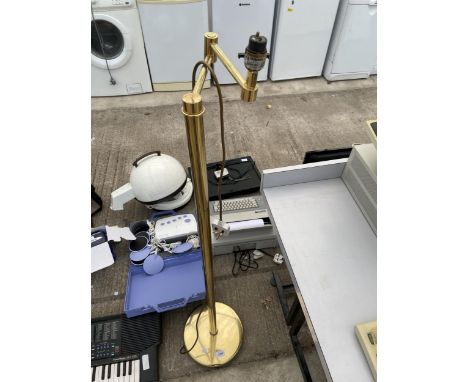 A LOW BRASS STANDARD LAMP 
