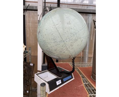 A RETRO KODANSHA GLOBE ON A STAND 