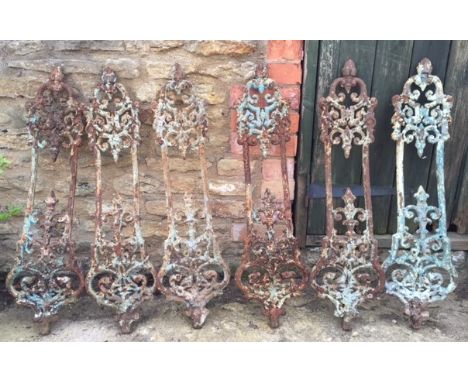 A SET OF SIX 19TH CENTURY COALBROOKDALE RAILINGS with pierced scrolling decoration, each railing 22cm wide x 82.5cm high
