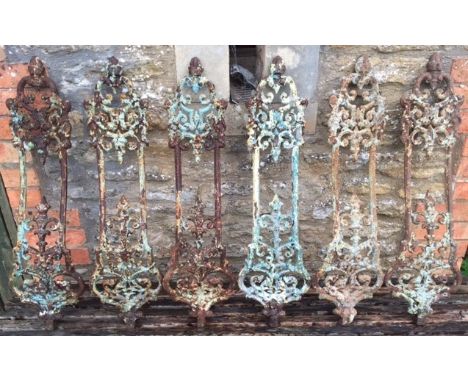 A SET OF SIX 19TH CENTURY COALBROOKDALE RAILINGS with pierced scrolling decoration, each railing 22cm wide x 82.5cm high
